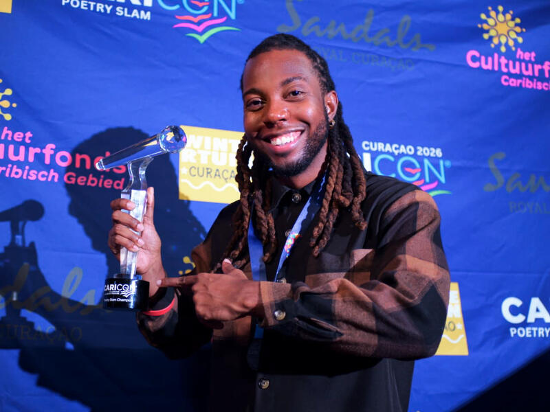 Akeem “Stonedwithcupid” Chandler-Prescod Wins CARICON Poetry Slam 2026 in Curaçao
